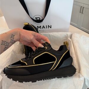 Balmain Women's Sneakers in Black and Gold